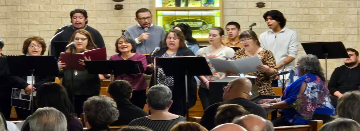 Choirs sing at Station of the Cross